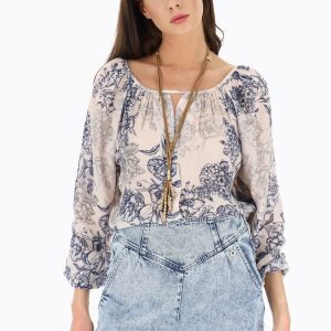 TOP A MOTIFS ET MANCHES BOUFFANTES